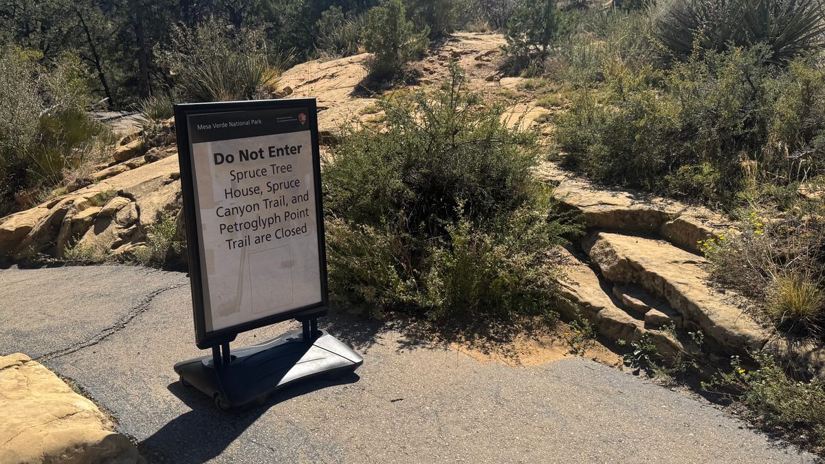 A federal shutdown closure notice posted at Mesa Verde National Park during the October 2025 government shutdown