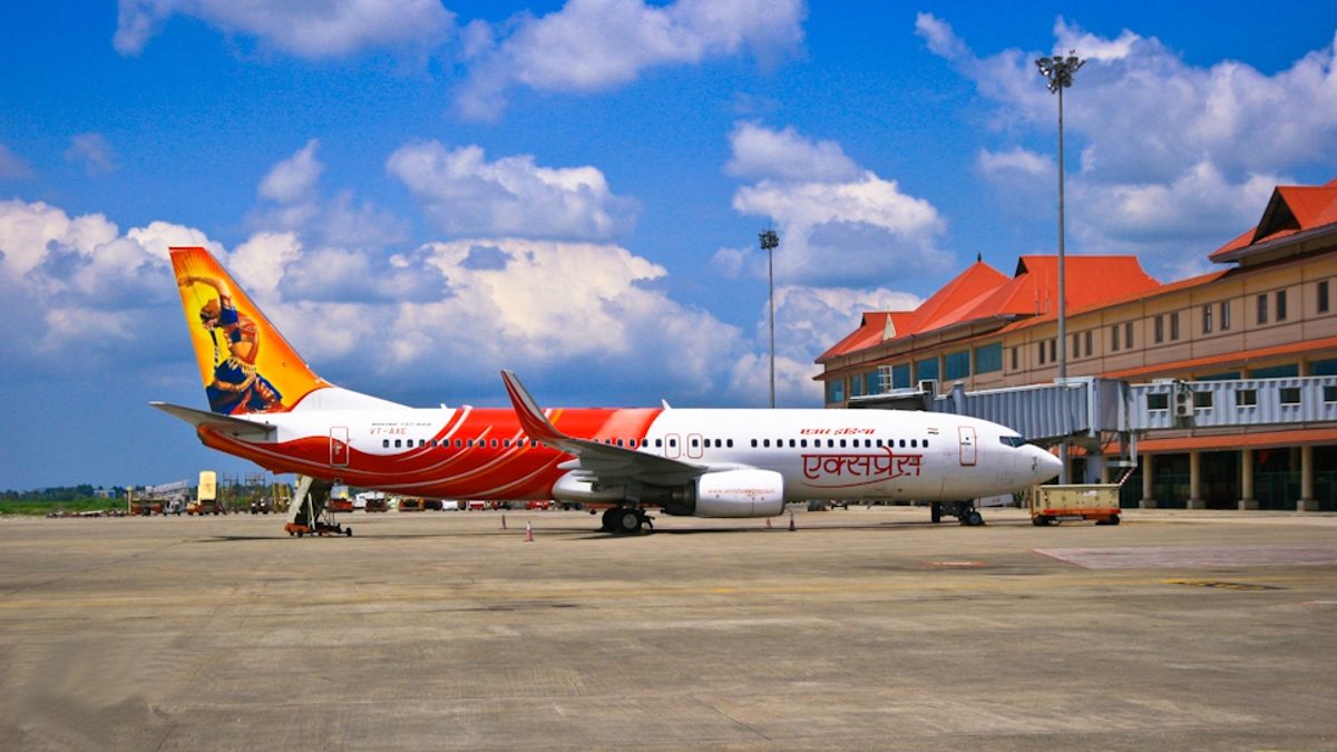 An Air India Express Boeing 737 parked at the terminal of Cochin International Airport